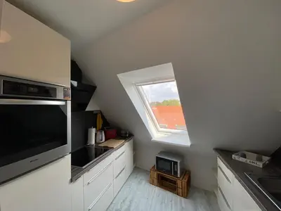 Küche/Küchenzeile in der Unterkunft Küstentraum Cuxhaven, FeWo schön & modern, Strand -Grimmershörnbucht