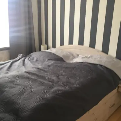 Ein Bett oder Betten in einem Zimmer der Unterkunft FeWo Nordseestraße