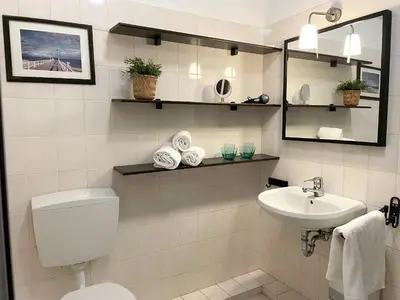 Ein Badezimmer in der Unterkunft Haus Land & Meer FeWo14