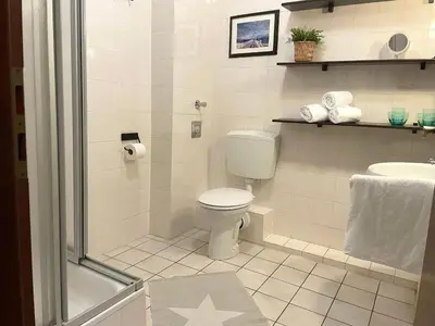 Ein Badezimmer in der Unterkunft Haus Land & Meer FeWo14
