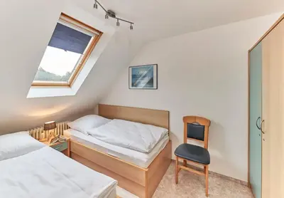 Ein Bett oder Betten in einem Zimmer der Unterkunft Dallacker 7 - Dachgeschoss