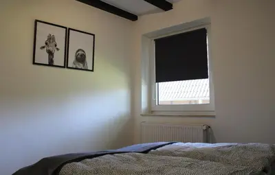 Ein Bett oder Betten in einem Zimmer der Unterkunft Ferienhaus Strandnah