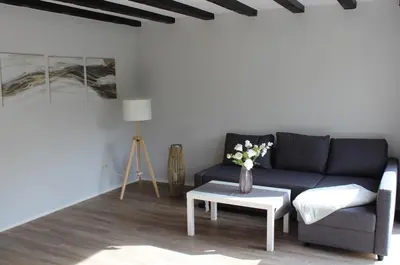 Ein Sitzbereich in der Unterkunft Ferienhaus Strandnah