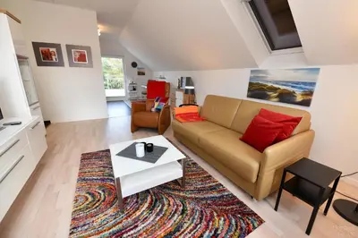Ein Sitzbereich in der Unterkunft Haus 4Muscheln Appartement 4M2