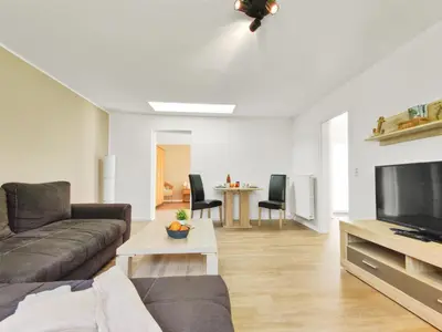 Ein Sitzbereich in der Unterkunft Haus Küstenperle