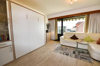 Ein Sitzbereich in der Unterkunft Haus Jan am Strand Wohnung - 215