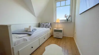 Ein Bett oder Betten in einem Zimmer der Unterkunft Haus Eversand Nr 2