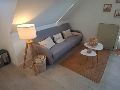 Ein Sitzbereich in der Unterkunft Perlebüdchen