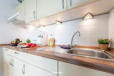 Küche/Küchenzeile in der Unterkunft Ferienwohnung Hafenschlösschen