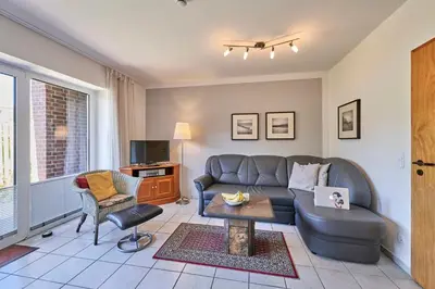 Ein Sitzbereich in der Unterkunft Haus Maike 13A