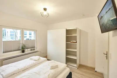 Ein Bett oder Betten in einem Zimmer der Unterkunft Heimathafen