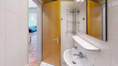 Ein Badezimmer in der Unterkunft Knechtsand - 403