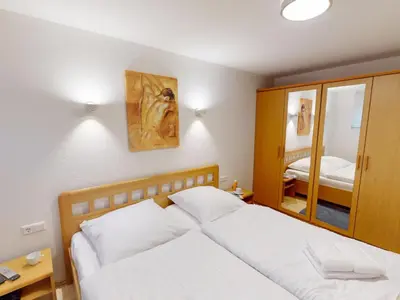 Ein Bett oder Betten in einem Zimmer der Unterkunft Knechtsand - 403