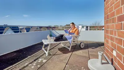 Ein Balkon oder eine Terrasse in der Unterkunft Knechtsand - 441