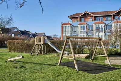 Ein Kinderspielbereich in der Unterkunft Knechtsand - 441