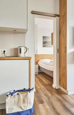 Ein Bett oder Betten in einem Zimmer der Unterkunft Meerauszeit