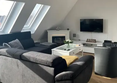 Ein Sitzbereich in der Unterkunft Ferienwohnung Seeherz