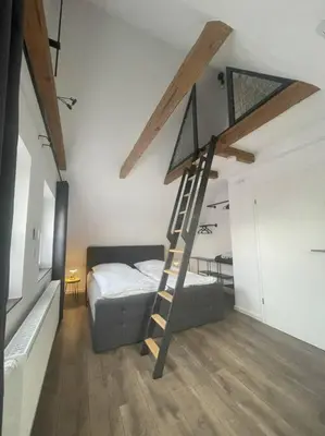Ein Bett oder Betten in einem Zimmer der Unterkunft GRYT Home - FeWo XXL - Nähe Nordsee