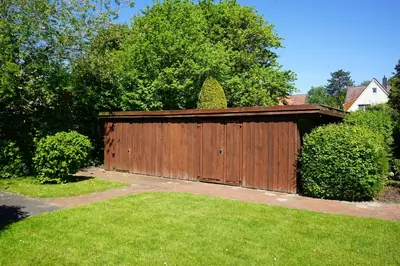 Ein Garten an der Unterkunft Kurpark Domizil 4