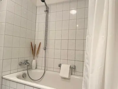 Ein Badezimmer in der Unterkunft Haus Nordseebrandung FeWo C2.2