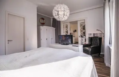 Ein Bett oder Betten in einem Zimmer der Unterkunft Haus Wellen und Meer Apartment 1