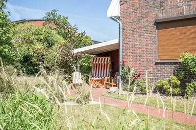 Ein Garten an der Unterkunft Haus Wellen und Meer Apartment 3