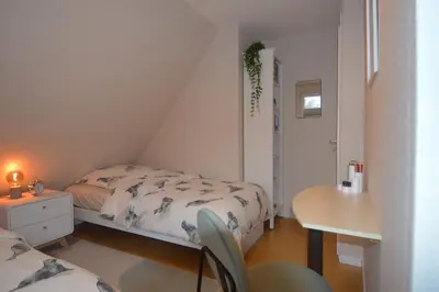 Ein Bett oder Betten in einem Zimmer der Unterkunft Ferienhaus Heimathafen