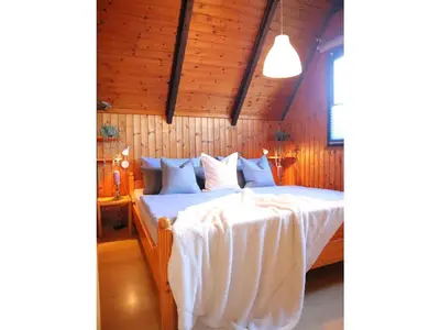 Ein Bett oder Betten in einem Zimmer der Unterkunft Haus am Deich