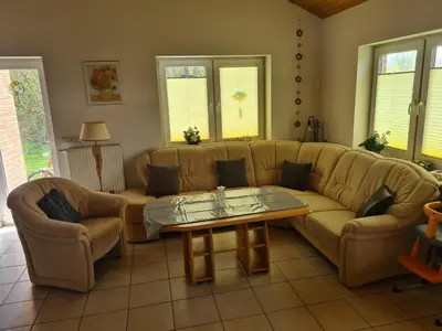 Ein Sitzbereich in der Unterkunft Ferienhaus Trio