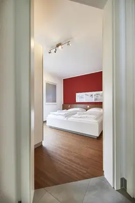 Ein Bett oder Betten in einem Zimmer der Unterkunft Residenz Seegras - 1