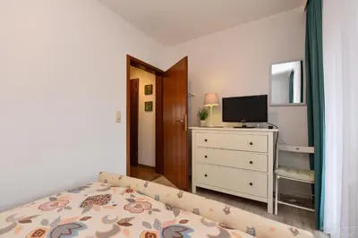 Ein Bett oder Betten in einem Zimmer der Unterkunft Haus 