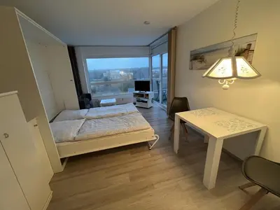 Ein Bett oder Betten in einem Zimmer der Unterkunft Frische Brise FeWo 04 05