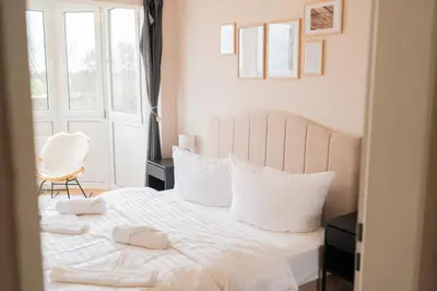 Ein Bett oder Betten in einem Zimmer der Unterkunft JAKSE-Apartments - Die entspannteste Wohnung an der Nordseeküste mit Sauna