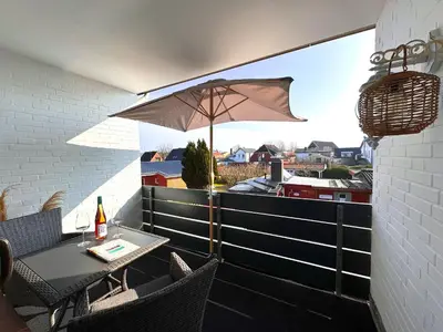 Ein Balkon oder eine Terrasse in der Unterkunft Atlantic Beach - by Mila FerienARPartments - Büsum Zentrum eigener Parkplatz Balkon
