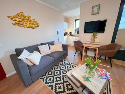 TV/Unterhaltungsangebot in der Unterkunft Outer Banks - by Mila FerienARPartments - Büsum Zentrum eigener Parkplatz Balkon