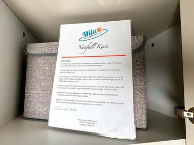 Ein Zertifikat, Auszeichnung, Logo oder anderes Dokument, das in der Unterkunft Outer Banks - by Mila FerienARPartments - Büsum Zentrum eigener Parkplatz Balkon ausgestellt ist
