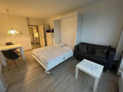 Ein Bett oder Betten in einem Zimmer der Unterkunft Frische Brise FeWo 04.05