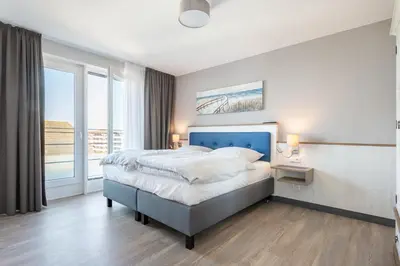 Ein Bett oder Betten in einem Zimmer der Unterkunft Seegarten Appartements Büsum
