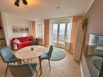 Ein Sitzbereich in der Unterkunft Watt & Wind - Pool, Sauna, Dampfbad, Tischtennis, schnelles WLAN