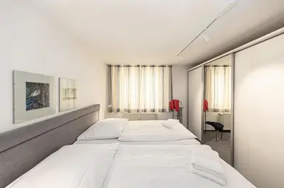 Ein Bett oder Betten in einem Zimmer der Unterkunft Seeterrassen - 12