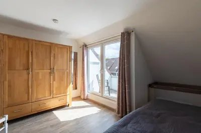 Ein Bett oder Betten in einem Zimmer der Unterkunft Haus Am Häfchenweg, Wohnung 5