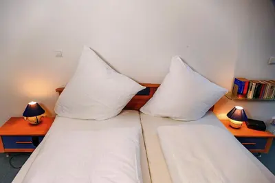 Ein Bett oder Betten in einem Zimmer der Unterkunft Haus Nordseebrandung NC74