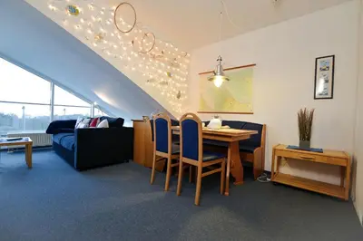 Ein Sitzbereich in der Unterkunft Haus Nordseebrandung NC74