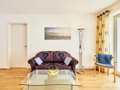 Ein Sitzbereich in der Unterkunft Strandpalais - C3