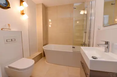Ein Badezimmer in der Unterkunft Strandhochhaus Döse Appartement STH009