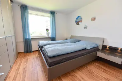 Ein Bett oder Betten in einem Zimmer der Unterkunft Strandhochhaus Döse Appartement STH009