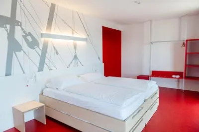 Ein Bett oder Betten in einem Zimmer der Unterkunft havenhostel Cuxhaven