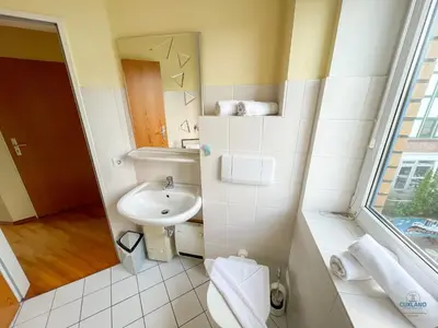 Ein Badezimmer in der Unterkunft Marina Blick