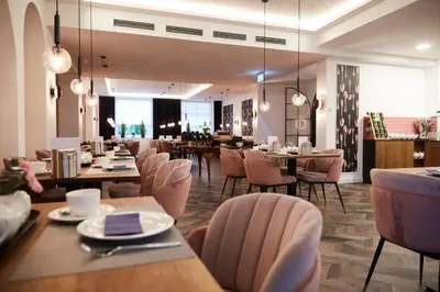 Ein Sitzbereich in der Unterkunft Grand Hotel Nautimar