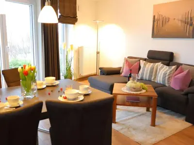 Ein Sitzbereich in der Unterkunft Ferienwohnung Nordseetraum